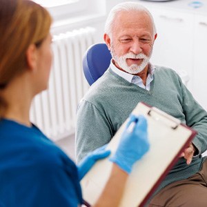 An older man attending a dental checkup