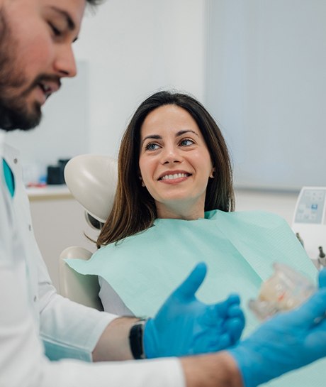 Woman smiling in the dental chair