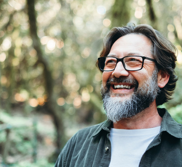 Man smiling outside